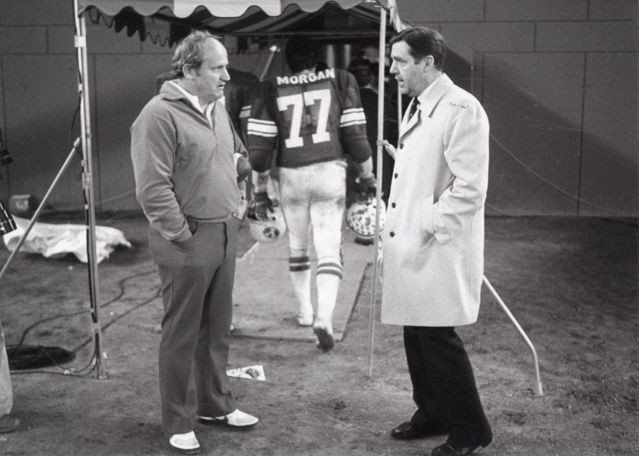 BYU President Jeffrey R. Holland chats with legendary BYU football coach LaVell Edwards.