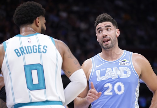 Cavaliers forward Georges Niang (20) has some NSFW words for Hornets forward Miles Bridges