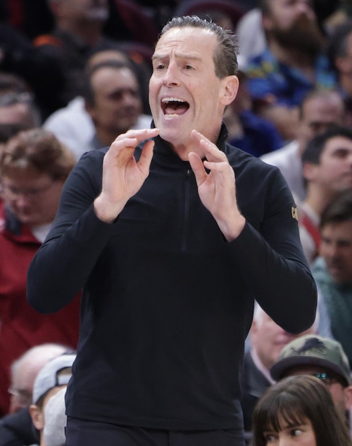 Cavs coach Kenny Atkinson yells out from the bench