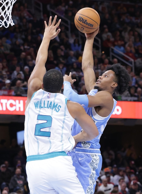 Cavaliers forward Isaac Okoro (35) puts up a shot