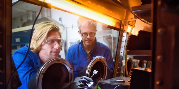 Mike McGehee and Tomas Leitjens working on solar cells