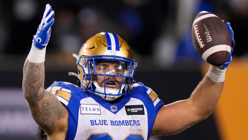 Winnipeg Blue Bombers running back Brady Oliveira (20) celebrates after scoring a touchdown against the Montreal Alouettes during the first half of the 110th CFL Grey Cup in Hamilton, Ont., on Sunday, November 19, 2023. THE CANADIAN PRESS/Nathan Denette