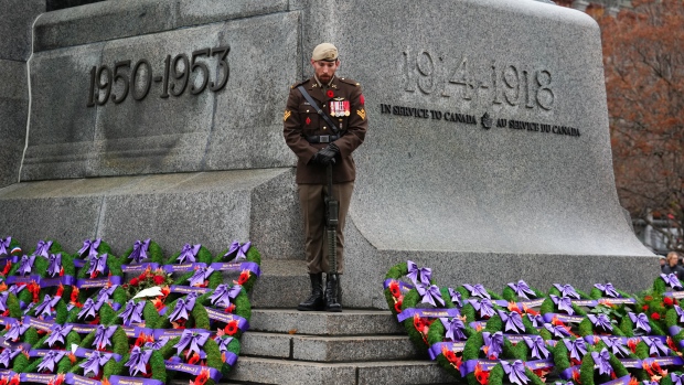 A sentry stands guard during the National Remembrance Day Ceremony at the National War Memorial in Ottawa on Monday, Nov. 11, 2024.THE CANADIAN PRESS/Sean Kilpatrick