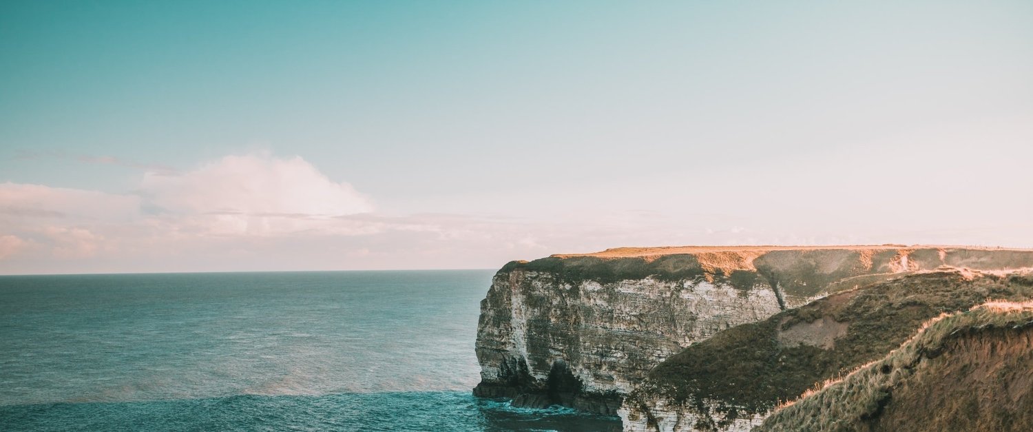 A view of white cliffs and the sea in Cornwall, the south of England