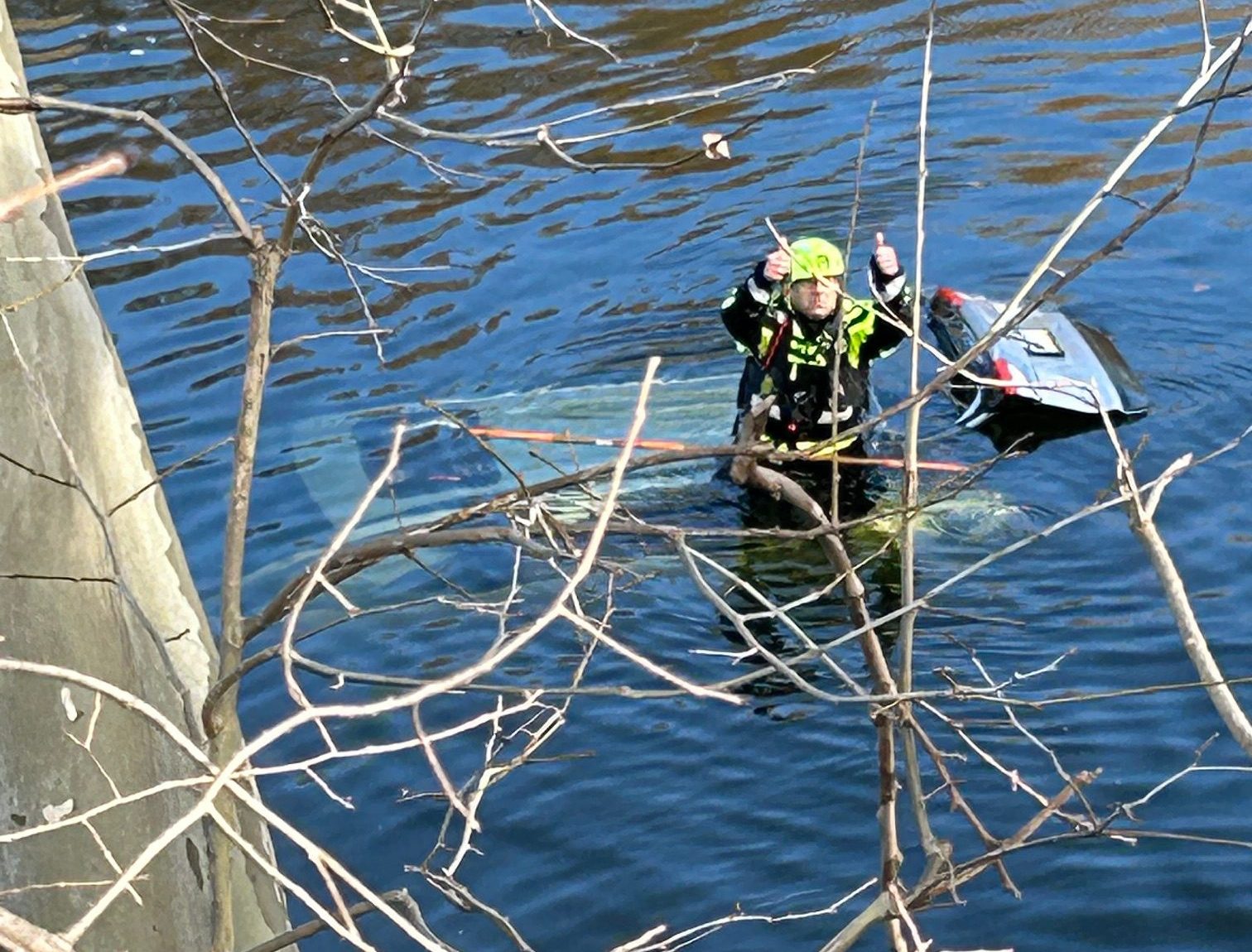 Emergency responders from Lower Merion rescued a 77-year-old woman from a car submerged in the river near Righters Ferry Road in Bala Cynwyd. (Courtesy of Merion Fire Company of Ardmore) 