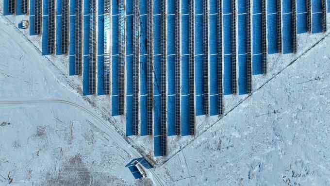 Solar panels in China’s snow-covered Gobi desert
