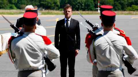 Emmanuel Macron stands during the departure ceremony for German President Frank-Walter Steinmeier at the Bellegarde airport in Limoges on June 10 2024