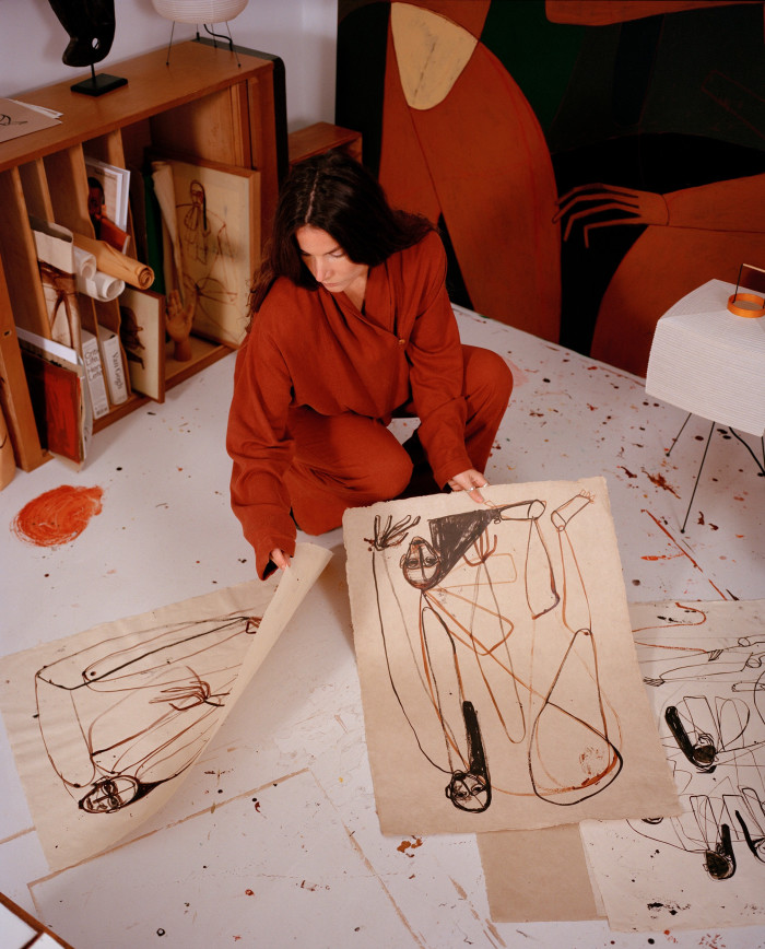 Kuiper with her ink drawings
