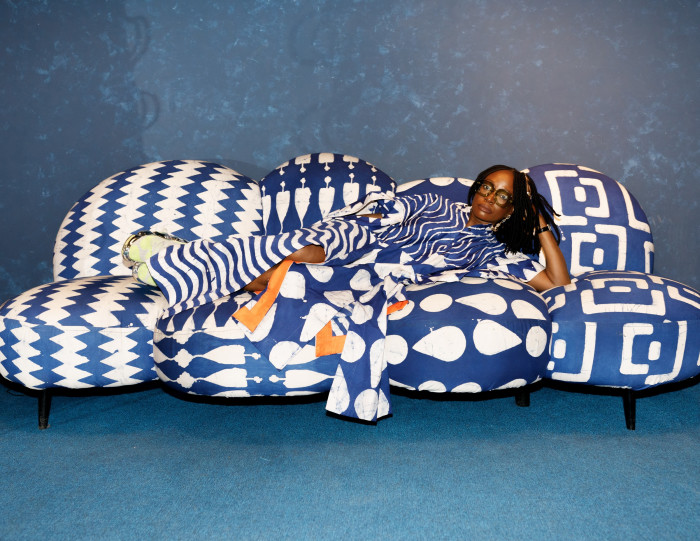 Dye Lab sofa, commissioned for the brand’s showroom in Lagos. Ladoja wears Dye Lab Osaka shirtdress, £210