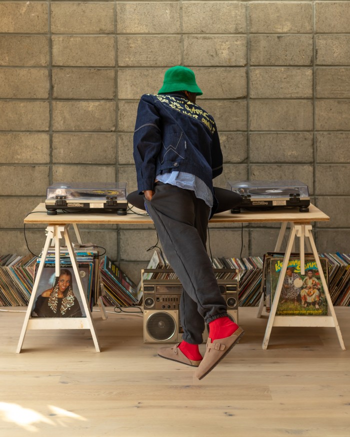 Adeyemi with his decks and vinyl