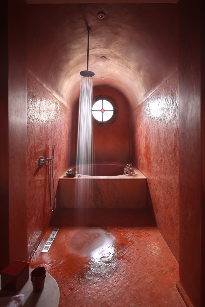 Wet rooms work well in saturated colour even if you play it safe elsewhere. This suite at Morocco’s El Fenn Hotel shows how smaller spaces can take strong shades without feeling swamped when there’s a good source of natural light