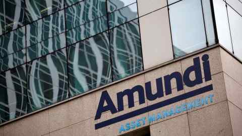 An Amundi sign on the side of a building in Paris