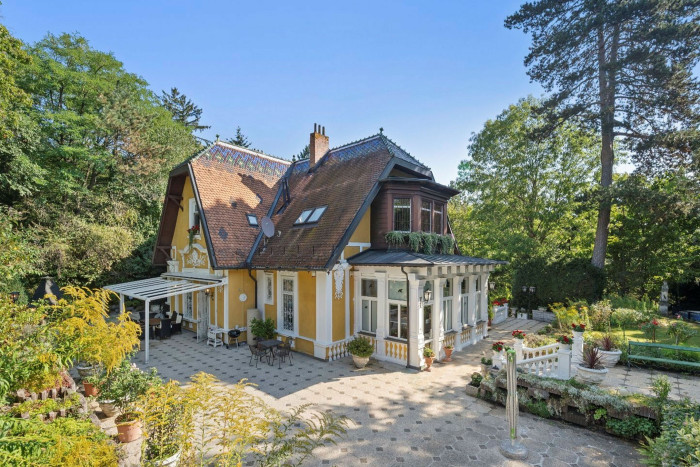 19th-century villa surrounded by woods