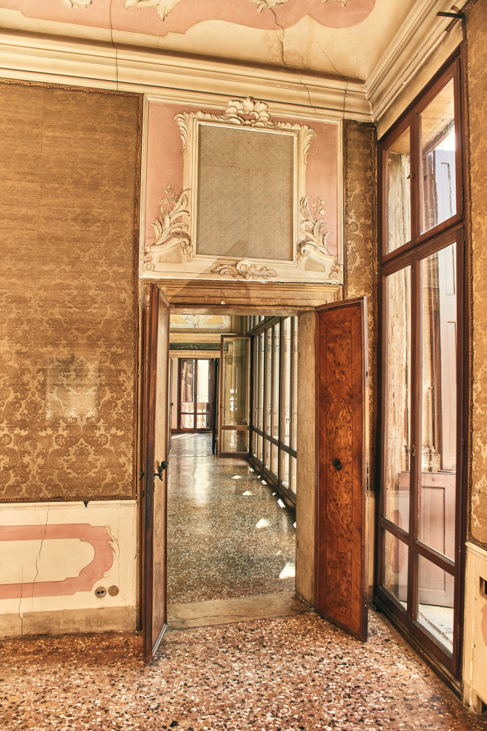 A stucco overdoor leading to the central hall 