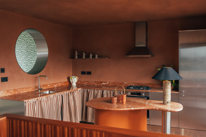 Colour enriches this Hackney home designed by Tatjana von Stein. “My client is Spanish so we tried to emulate the Mediterranean using a typical plasterwork finish in juxtaposition with more urban, modernist metal features and apertures,” she says of the strong tones and textural walls that define the decor