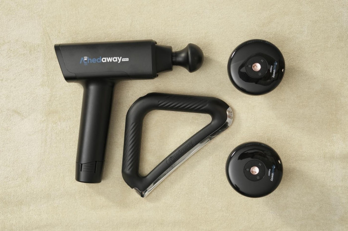 The Achedaway Scraper (centre), £209, next to the Achedaway Pro Massage Gun (left), £239, and Cupper Pair (right), £249