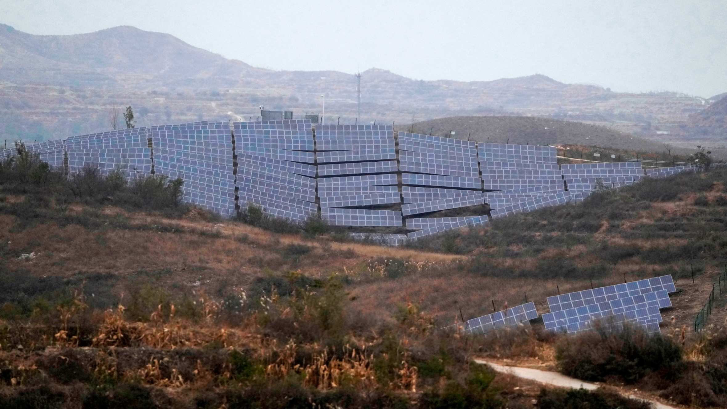 A solar farm next to Donggou village in northern China’s Hebei province