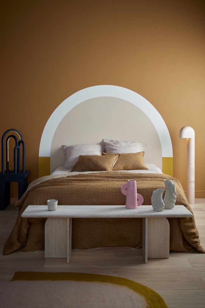 Restful rooms require more muted palettes. Painting this bedroom ochre sets the tone for relaxation. On the back wall is L’Alchimiste, which is teamed with Le Portrait on the inner wall of the arch and Le Cocon (White) and L’Alliance, all shades by Ressource Peinture, priced €26.90 per litre 