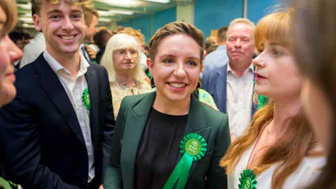 Carla Denyer surrounded by people after the result was announced