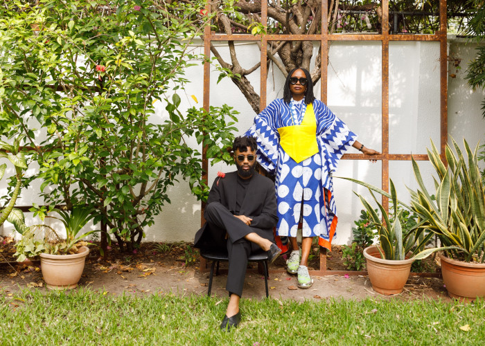 Ré Olunuga and Rukky Ladoja, wearing Dye Lab Osaka shirtdress, £210, and bib, £25, at O’DA art gallery, Lagos 