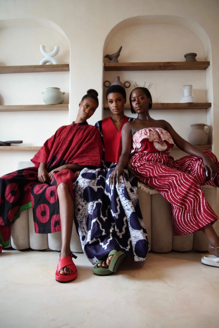 From left: Dye Lab hand-dyed Osaka shirt dress, £210. Hand-dyed Agbada kaftan with hand-woven collar, £175. Hand-dyed strapless top, £45, and culottes, £105. Sandals, all by Kkerelé