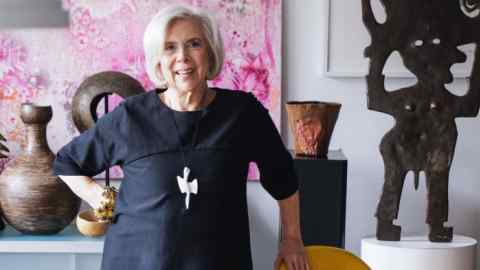 Jewellery collector Susan Lewin photographed at home with her pieces