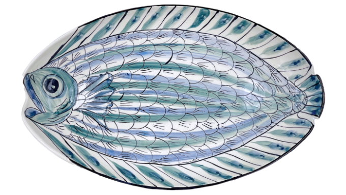 a hand-painted, ceramic platter in the shape of a fish