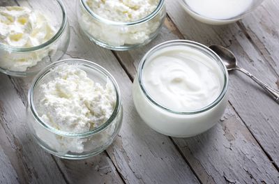 Kefir and yogurt on glass bowls