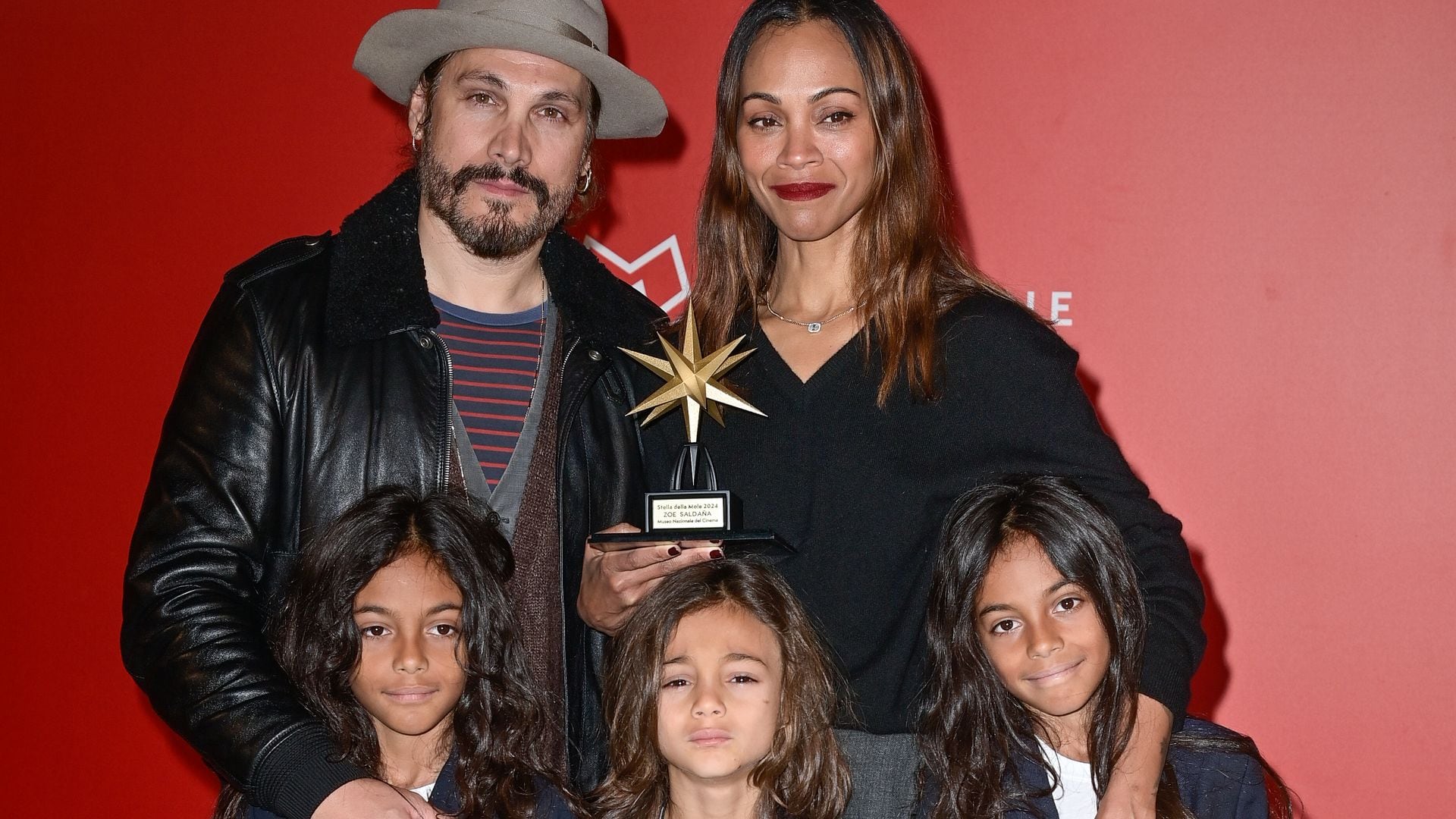 Zoe Saldaña makes adorable red carpet appearance with her three sons