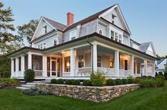 Large home with wraparound porch