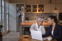 Woman going over things with her daughter