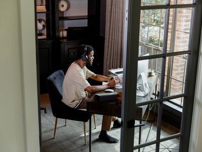 High angle view of mid adult man working from home