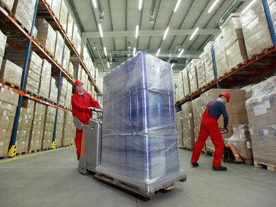 Two Workers Working in Storehouse