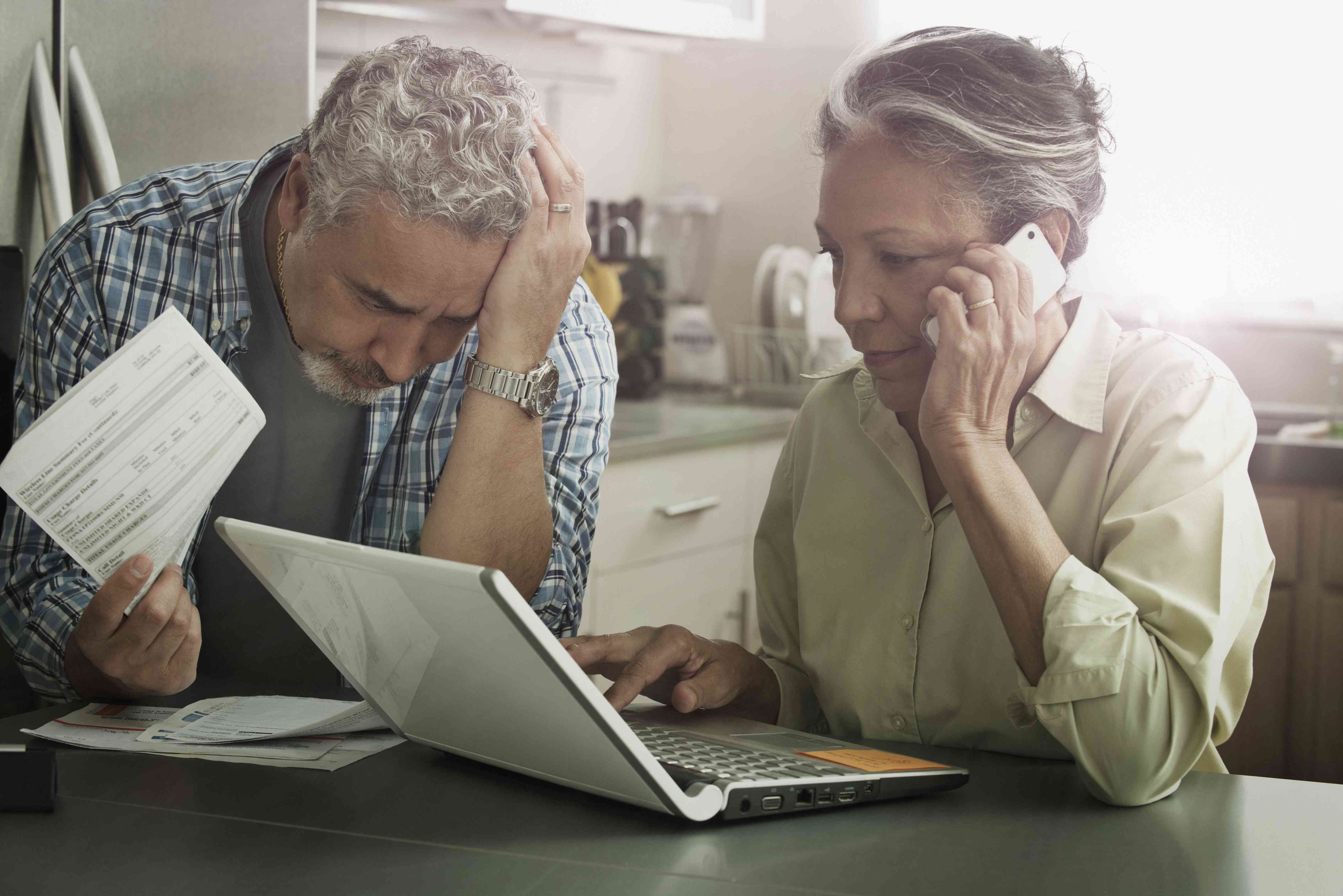 Stressed couple in kitchen