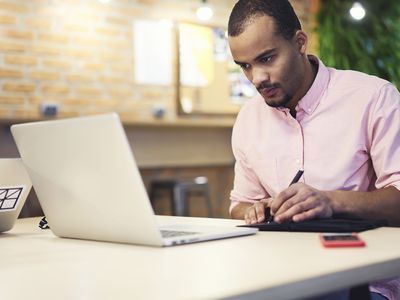 An investor researches a mutual fund as part of his due diligence.