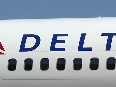 A Boeing 757 with a new Delta Airlines logo.