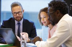 Financial advisor having a meeting with clients