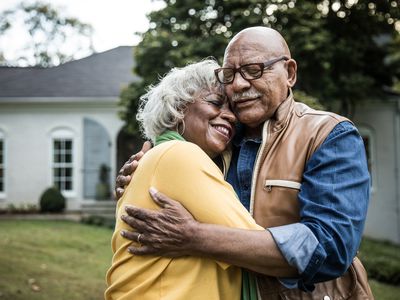 A couple hugging outside