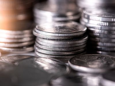 The Abstract Image of the Coin Stack and Sunlight