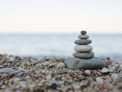 Balanced stones on a pebble beach