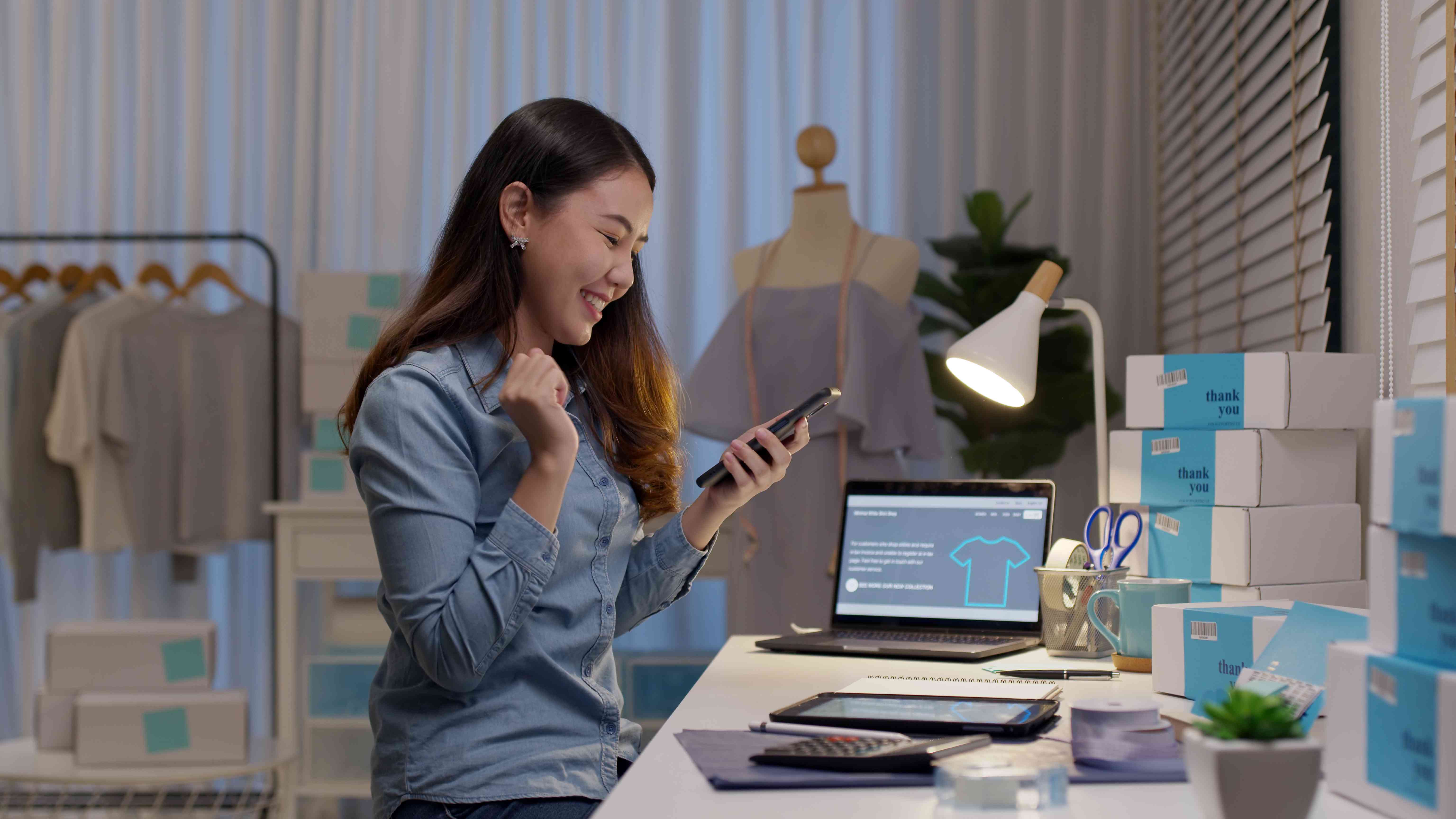 An entrepreneur works at a desk.