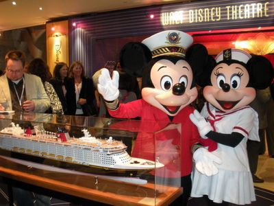 Mickey Mouse, Minnie Mouse, and the model of the Disney Dream at the Disney Dream Preview Event