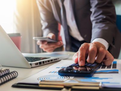 Businessman Working at Desk in Office