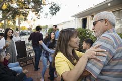 People dancing on a patio