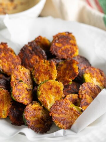 Vegan Brussels sprouts coated in a crispy and cheesy seasoning.