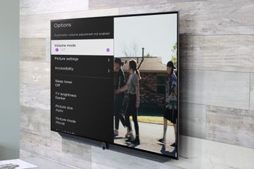 The Volume mode highlighted from the Options menu on a wall-mounted Roku TV.