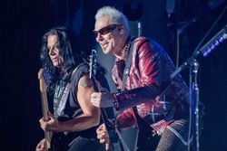 Pawel Maciwoda (L) and Rudolf Schenker of Scorpions perform on stage at FivePoint Amphitheatre on September 2, 2018 in Irvine, California.