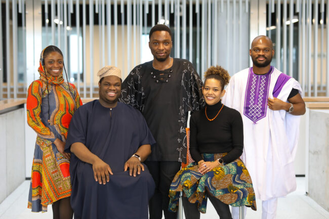 Members of NSBE Graduate Student Chapter at the University of Toronto showcase clothing from their cultural backgrounds. From left to right, back row: Osarugue Ize-Iyamu (Year 4 MIE); NSBE Grad’s executive secretary, Caleb Okechukwu (MIE MEng student); vice president, Bethel Unwan (MIE MEng student); front row: treasurer, Reke Ferdinand Avikpe (BME PhD candidate); and internal advisor, Dimpho Radebe (ChemE PhD candidate). (photo by Safa Jinje)