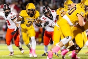 Davison senior running back AJ Hill finds some room to run during the first half on Friday, Oct. 18, 2024 at Cardinal Stadium. Grand Blanc defeated Davison 55-49.