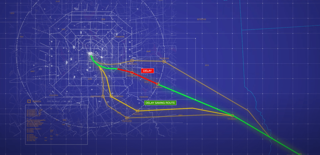 A computer display of a map shows several lines which represent possible air traffic routes for an airplane to follow.